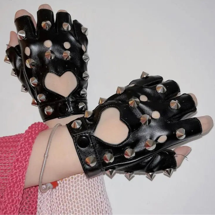 Black leather gloves with studs and heart designs