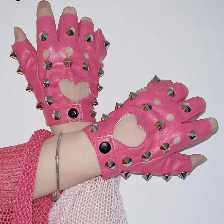 Pink gloves with heart cutouts and studs on a white background